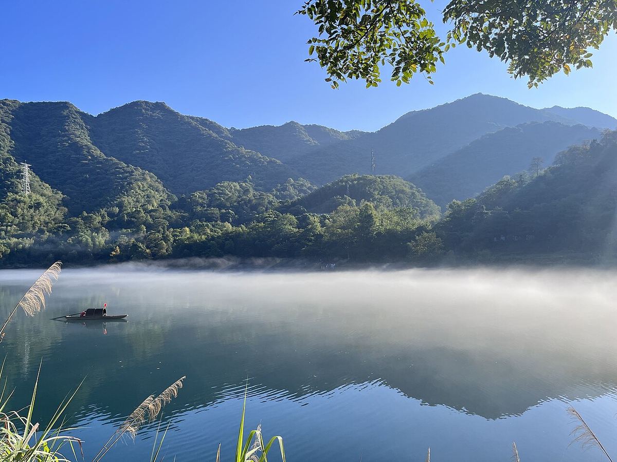 Morning mist over Dongjiang Lake, Zixing, Hunan
