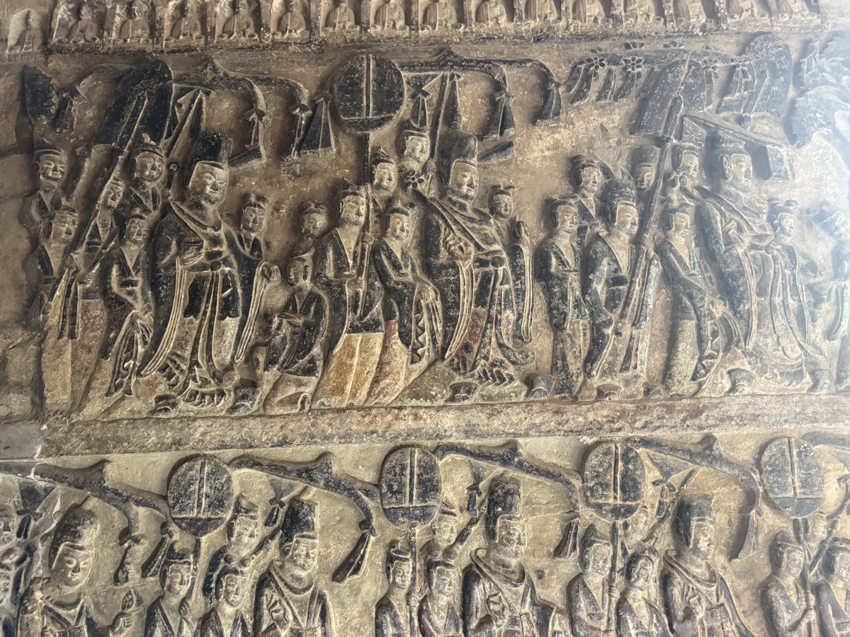 Procession relief: attendants holding canopies