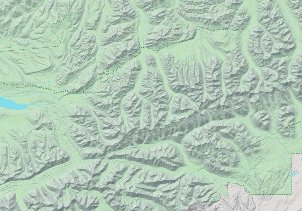 The park entrance is at the east end; the park road runs west to Wonder Lake and Kantishna, and Denali stands due south of Wonder Lake; hillshade and 100 m contours