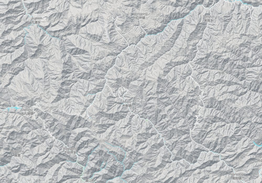 Shennongding peak is in the south of the area and Songbai town in the north; hillshade and 100 m contours
