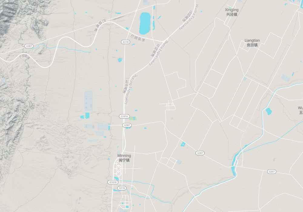 The Western Xia tombs lie at the eastern foot of the Helan Mountains, with Yinchuan to their northeast; hillshade and 100 m contours